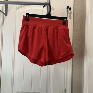 CRZ YOGA Women's Quick-Dry Loose Running Shorts w/ Pockets Red Size S Brief Line